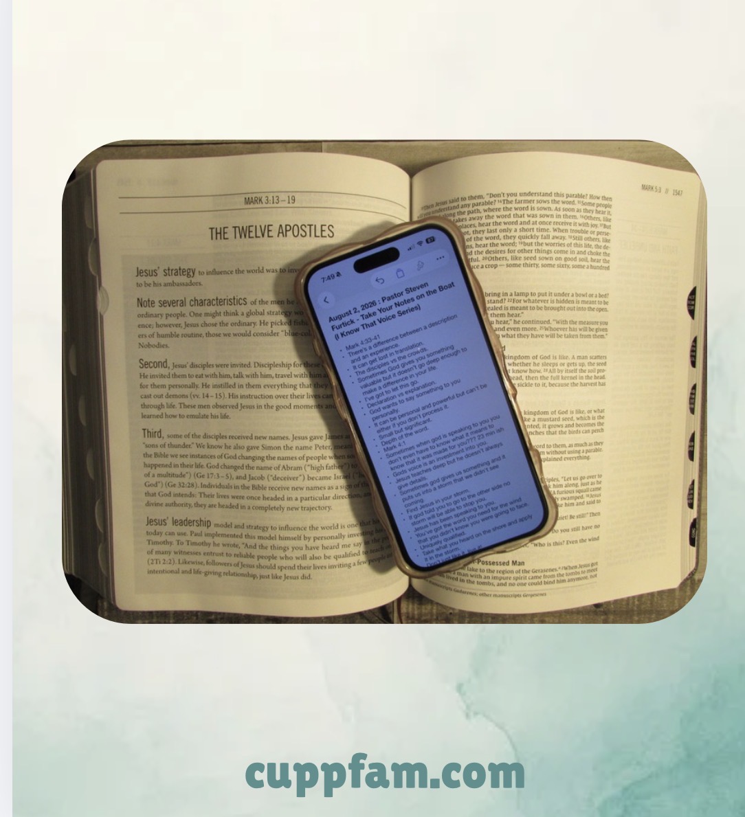 a phone with notes typed sitting on top of a bible with a decorative background cuppfam.com adorns the bottom of the page.